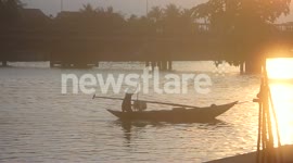 Vietnamese Fisherman at Sunset
