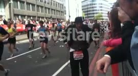Charlie Chaplin runs the marathon