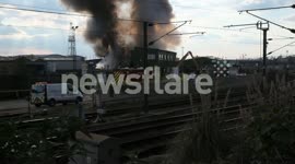 Close-up footage of Scrubs Lane fire in Willesden, London