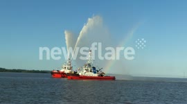 Humber tugs, water canon, rainbow