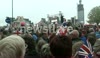Crowds wait expectatntly for the Queen to pass - Jubilee Floilla
