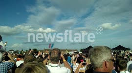 Red Arrows fly past at Yarborough Sports Ground for the Olympic Torch Relay.