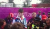 Pete Wilson showing his Gold Medal to the crowd