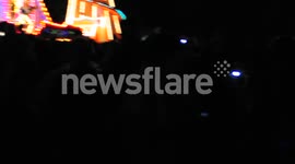 Robbie Williams camera flash moment at Bristol Hot Air Balloon Fiesta
