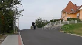 riding a Samsonite suitcase in Hungaria