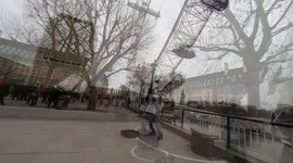 Street Entertainers on the South bank of the Thames London uk