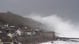 Waves breaking over cliffs at Sennen, Cornwall