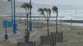 Bournemouth, UK. The pier and beach during stormy weather 12 Feb 14