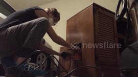 Girl Uses Random Orbit Sander to Smooth Off Woodwork