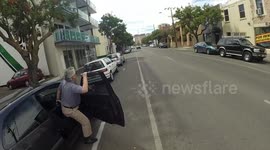 Getting doored - Motorist almost takes out cyclist