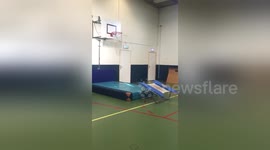 Newsflare Edit - Cool, multi-person basketball trick shot