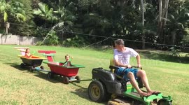 Australian dad finds way to mow lawn and keep cool in Sydney heatwave