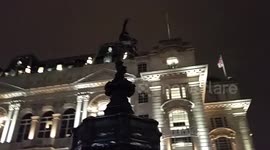 Snow falls down in Piccadilly Circus
