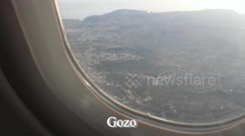 Air Serbia Airbus 319 flyng over Gozo and landing in Malta