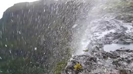Strong winds blow waterfall backward on Reunion Island