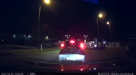 Car travels the wrong way around a roundabout