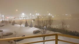 Near whiteout conditions during snowstorm in Montreal