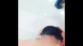Man sneakily keeps adding more shampoo to friend's hair while he showers