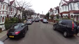 Driver appears to hit Porsche while reversing