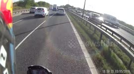 Driver on the phone, TRIES to hide it lol.