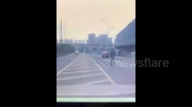 Driver runs after his car moving forward itself on road