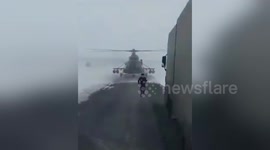 Newsflare Edit - Helicopter landed on the highway