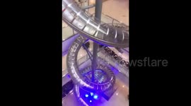 Giant four-storey slide in shopping mall in southern China
