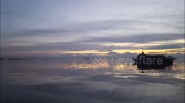 Ship cruising in a calm sea in 4k