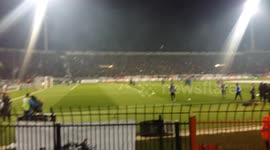 Players of the two teams warm 30minutes before the match