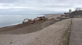 Beach rebuilding work after storm Doris