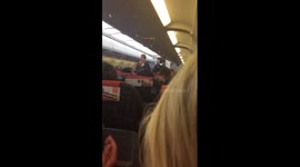 Passengers cheer as rowdy yobs escorted off Easyjet flight