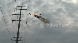 Chinese power company uses flame-spewing drone to burn rubbish off high-voltage wires