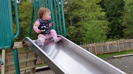 Brave Toddler Slides Down Tall Playground Slide - Caught by Grandpa