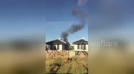 Smoke cloud rises from fatal plane crash site in Melbourne