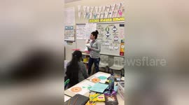 Fourth grade teacher raps for students