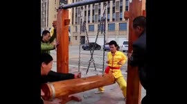 Chinese kung fu masters show off their “balls of steel”