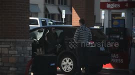 Fueling up strangers cars. She LIVED in her car