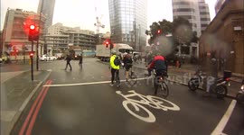 Newsflare Edit - Powerful Storm Doris winds spin cyclist during London commute