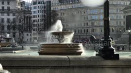 Newsflare Edit - Trafalgar Square fountains struggle to cope with Storm Doris winds