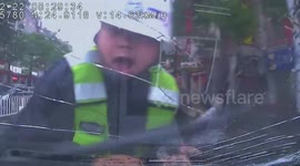 Alleged drunk driver drags police officer on bonnet for hundreds of metres