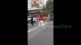 Driver overcome by road rage dances to block traffic