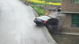 CCTV captures car smash into house