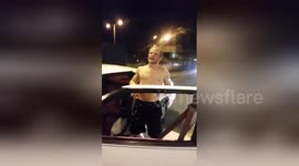 Newsflare Edit - Guy dances in street and holds up traffic