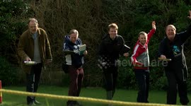 Three priests with bibles join annual pancake race on Portland