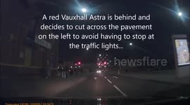 Car cuts across pavement and runs red lights in Sheffield