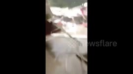 Building’s roof torn off by strong winds in eastern China