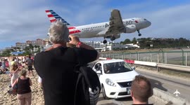 Tourists witness ridiculously low landing at Caribbean airport