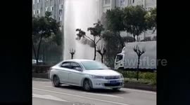 Car wash queue gets drenched by burst water main