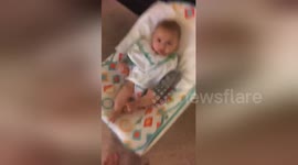 Newsflare Edit - Cutest baby boy mimics daddys every move!!