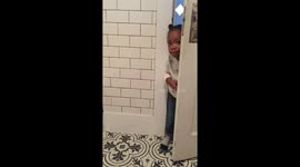 Toddler won't let her mum use the bathroom in peace